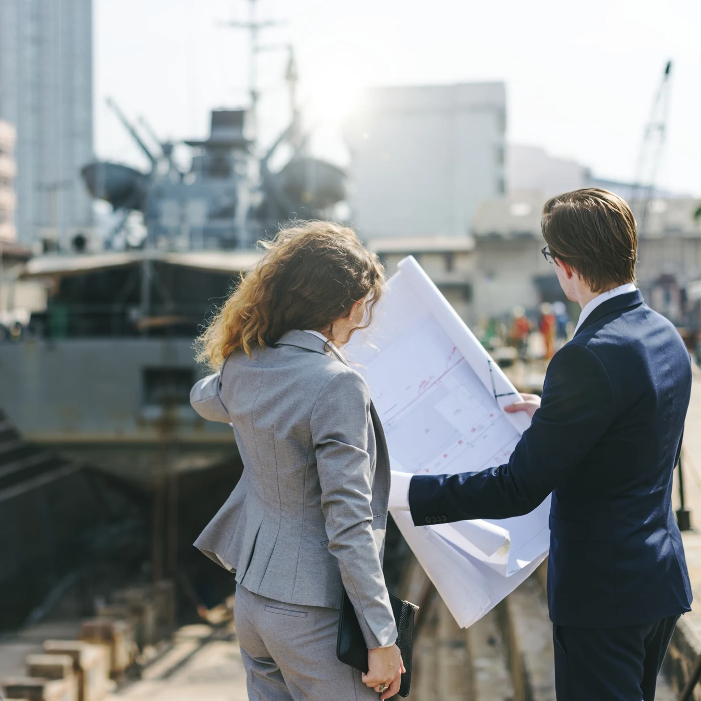 Engineers reviewing construction plans